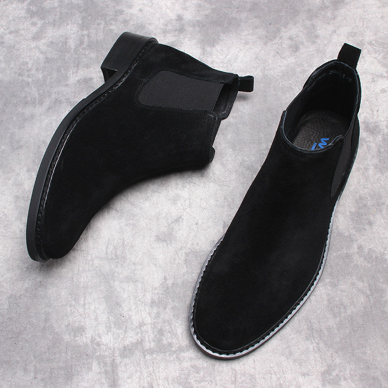 Men's black Chelsea dress boots, side and heel view with elastic gore