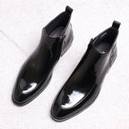Men's thick-sole leather side-zip boots, black, pair view angled from above