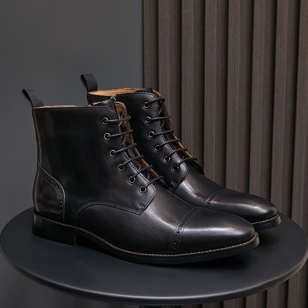 Men's pointed-cap-toe leather dress boots, black, lace-up pair side view