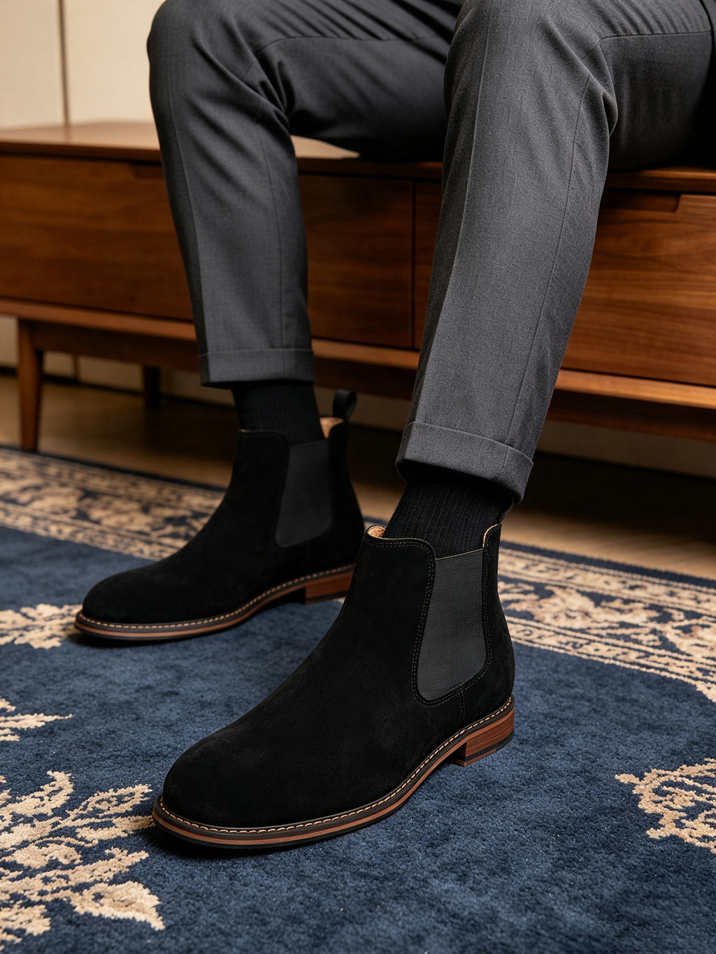 Black suede Chelsea ankle boots with elastic side gore and low stacked heel