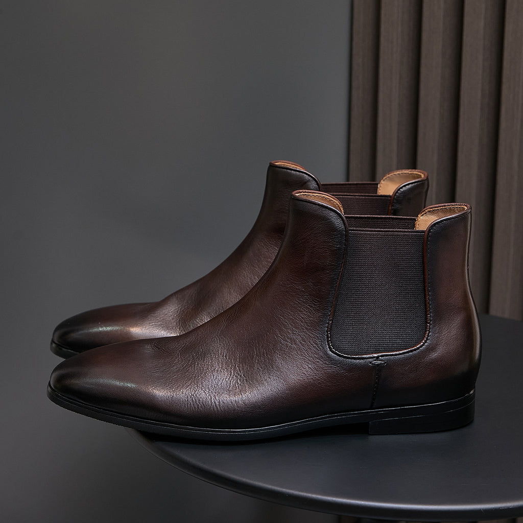 Dark brown suede Chelsea dress boots, side angle with elastic gore panels