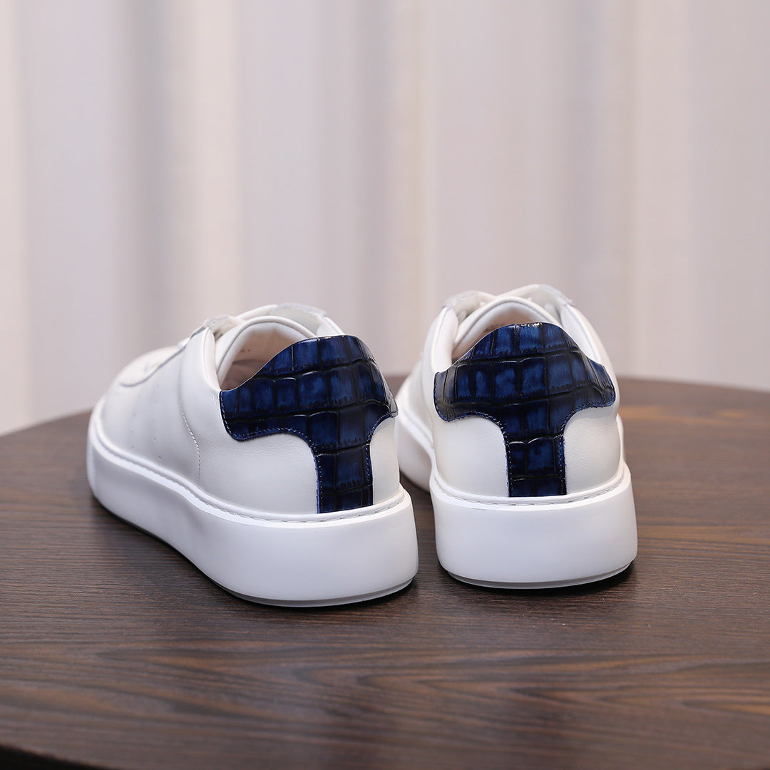 Men's leather sneakers, white with dark blue heel, rear view on platform sole