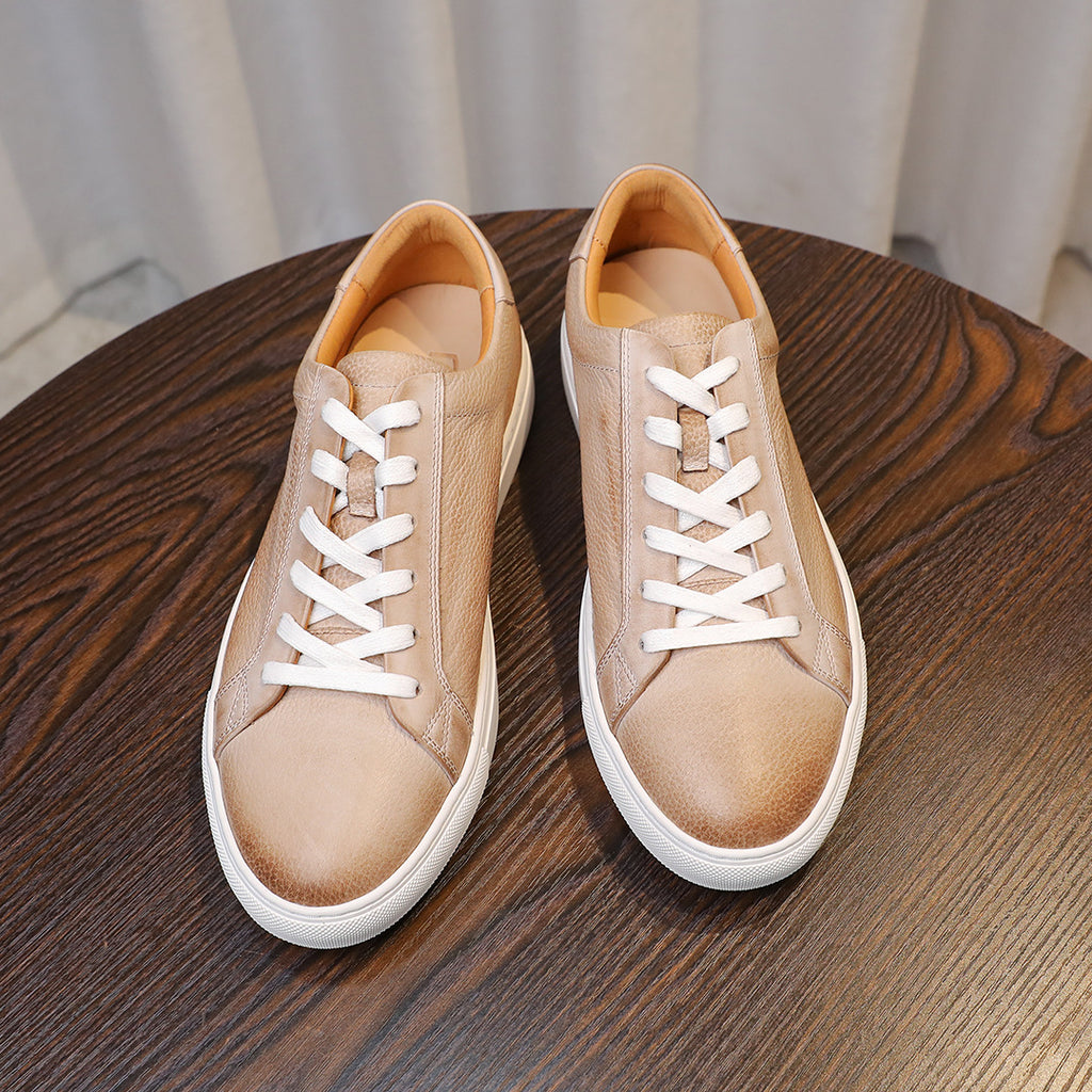 Men's leather sneakers, beige/tan, front view pair with lace-up closure