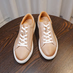 Men's leather sneakers, beige/tan, front view pair with lace-up closure