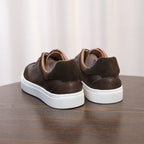 Men's dark brown leather low-top sneakers with suede heel, lace-up, white rubber sole