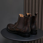 Pointed-toe chelsea dress boots pair with elastic panels, dark brown and black pair