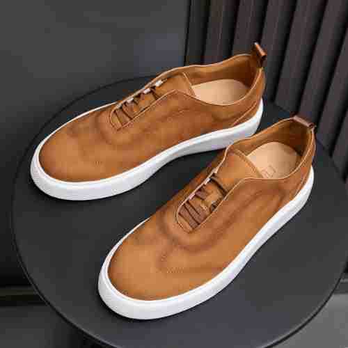 Men's genuine leather sneakers in brown with lace-up detail and white platform sole