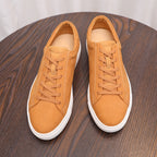 Men's leather sneakers, tan suede, lace-up front with white rubber sole