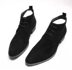 Black lace-up dress boots with stitched panels and low block heel