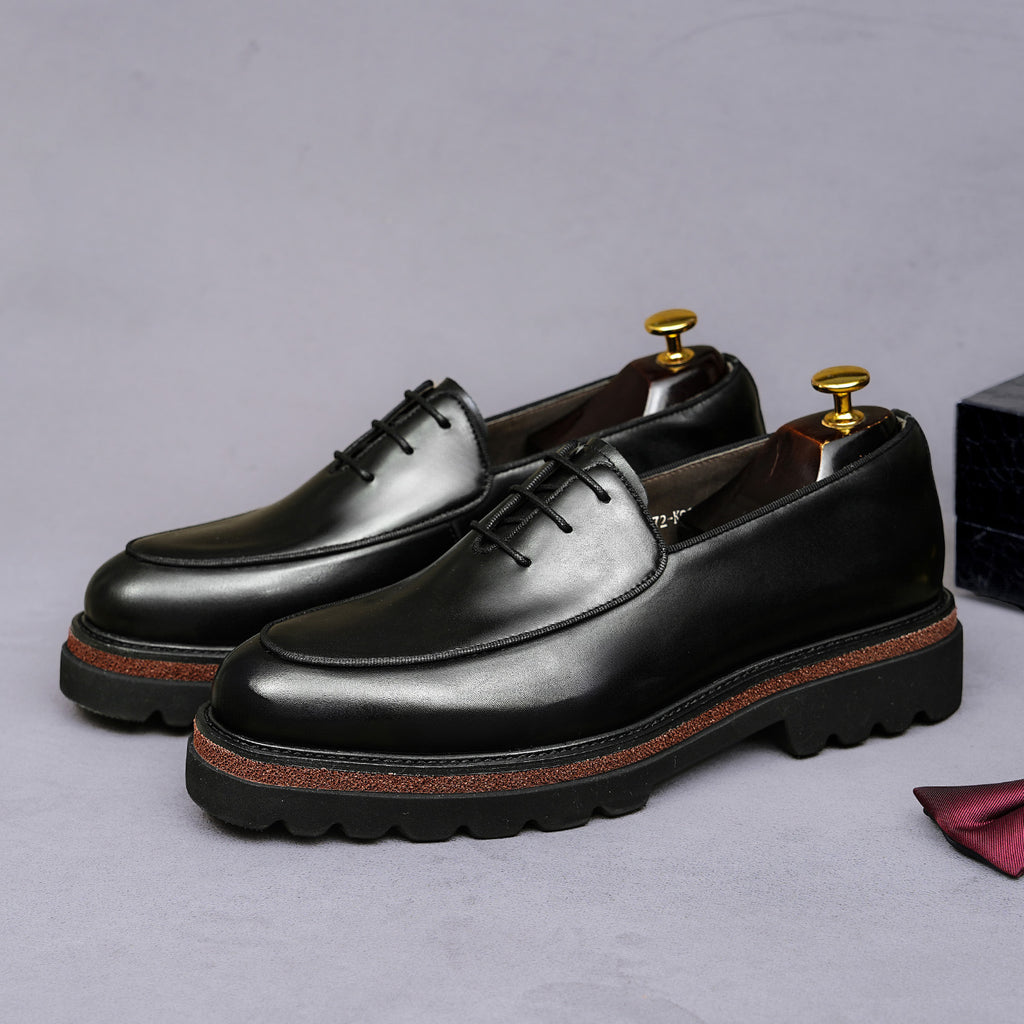 Men's chunky lug-sole oxfords, black leather with brown edge trim and lace-up