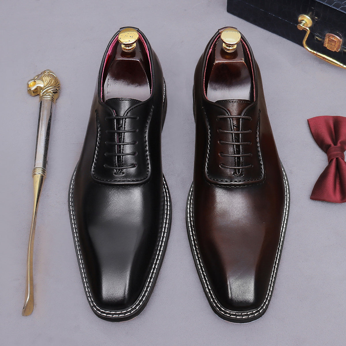 Men's chunky lug sole wingtip brogue oxford shoes, pair in black and dark brown front view.