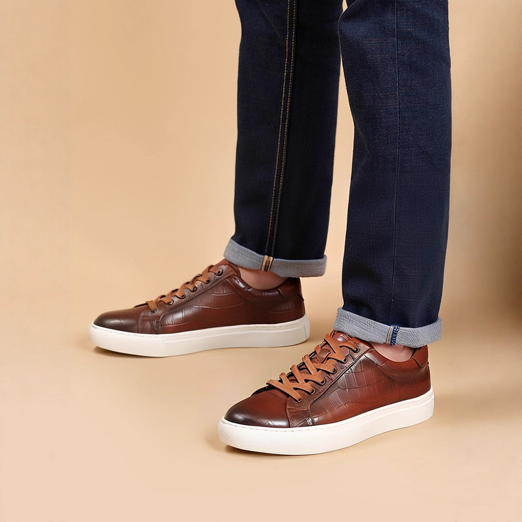 Men's brown leather sneakers with lace-up front and white rubber sole