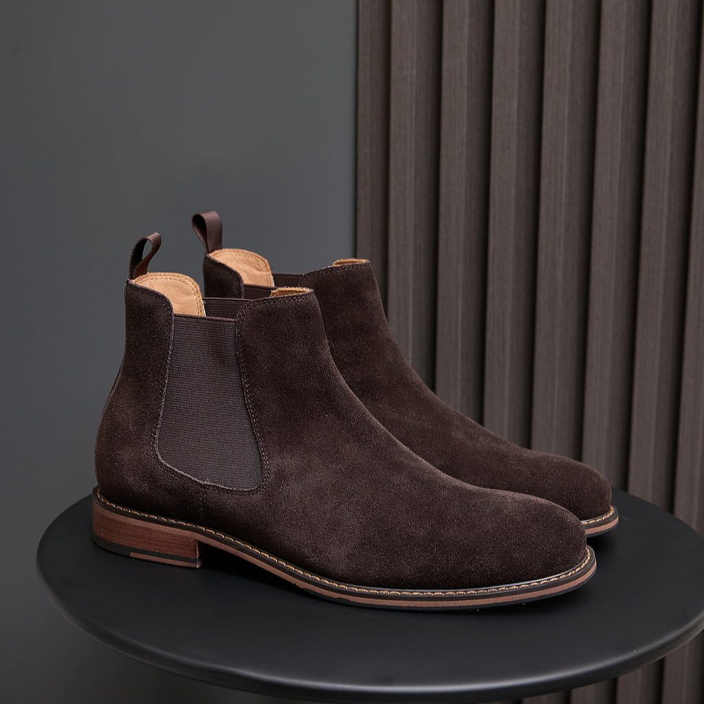 Dark brown suede Chelsea dress boots with elastic side panels and tan welt sole