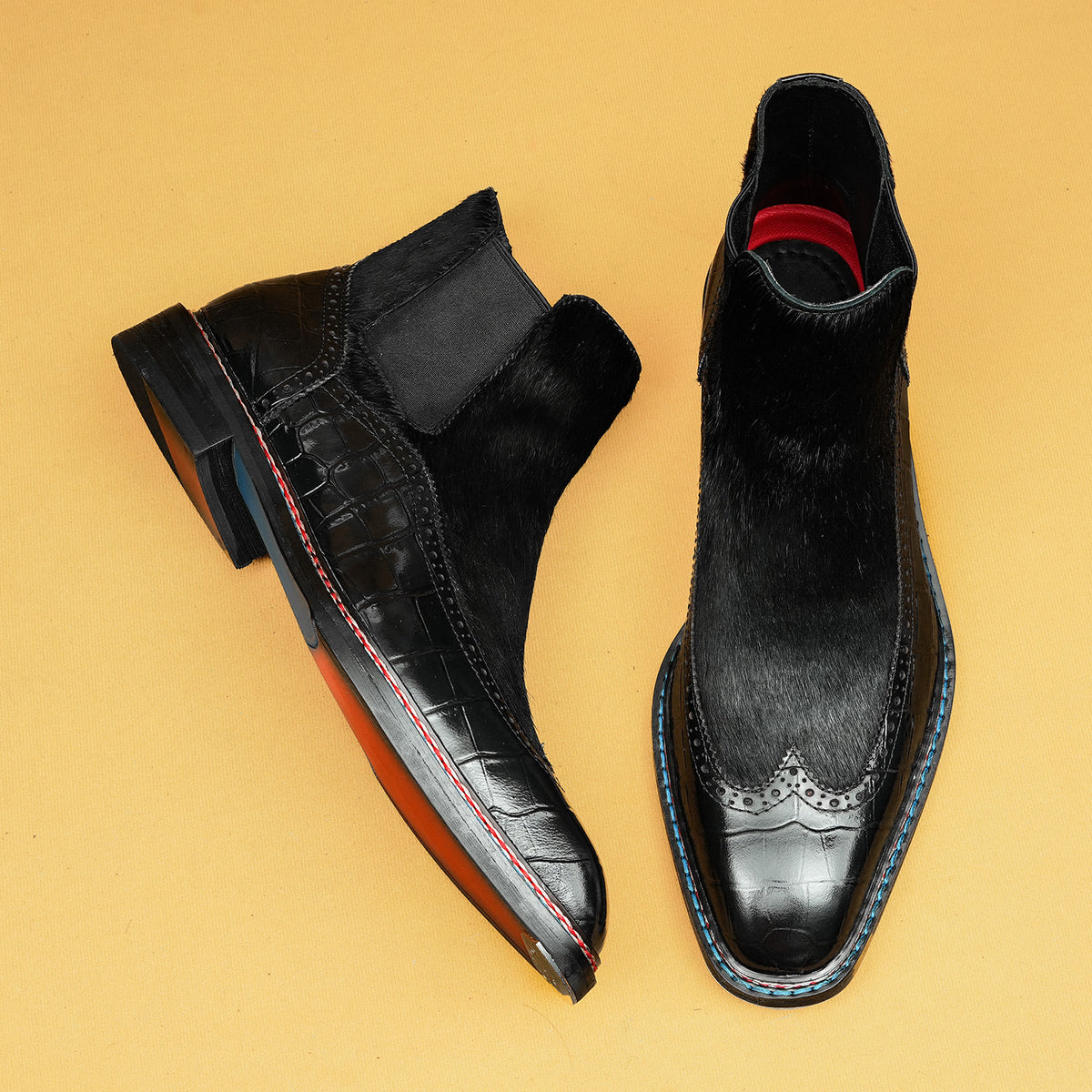 Black leather chelsea dress boots, slip-on with elastic gore and red-lined collar