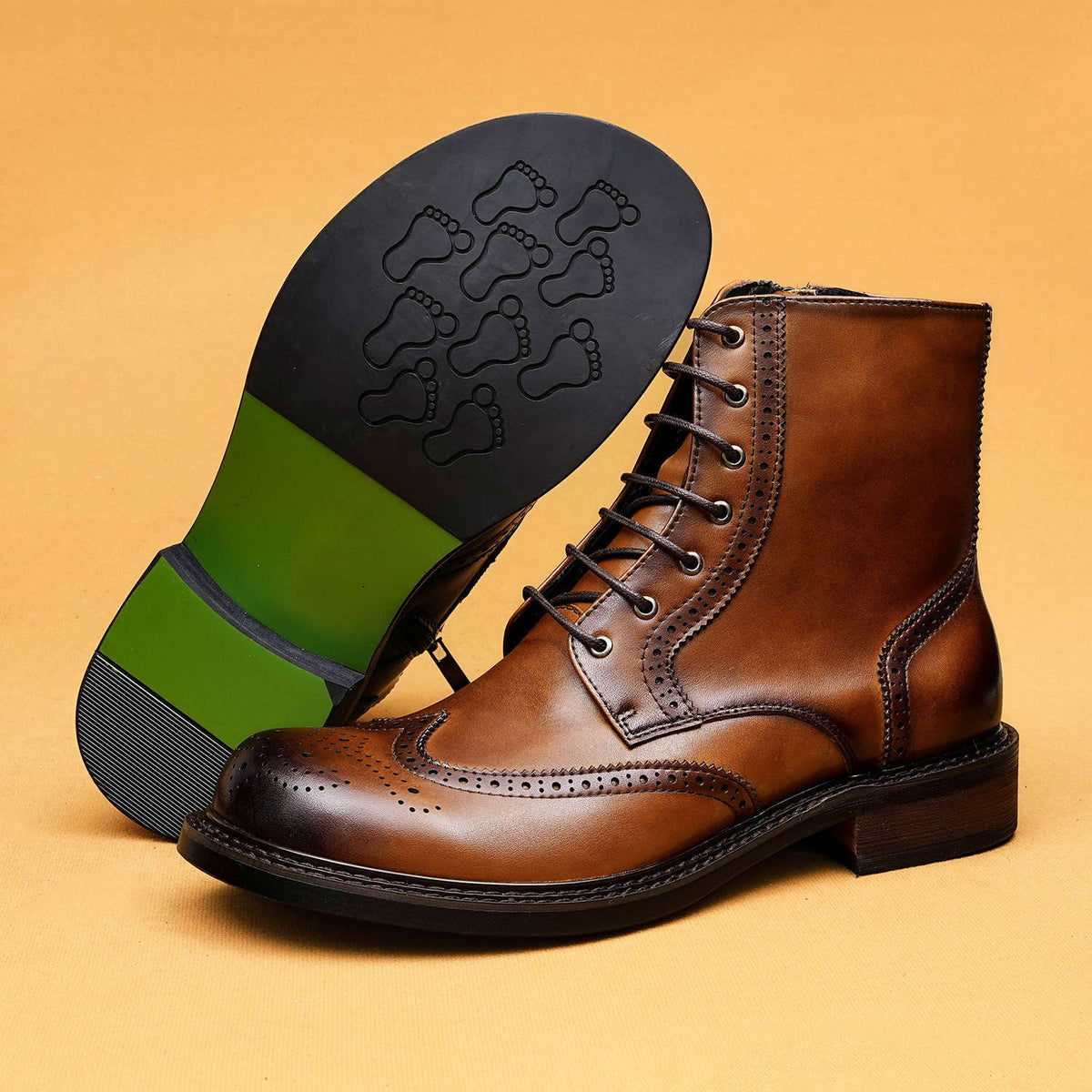 Brown leather lace-up formal boots with thick sole, wingtip perforations, and laces