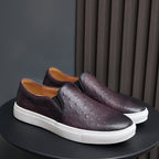 Men's dark purple slip-on leather sneakers with white rubber sole and textured leather