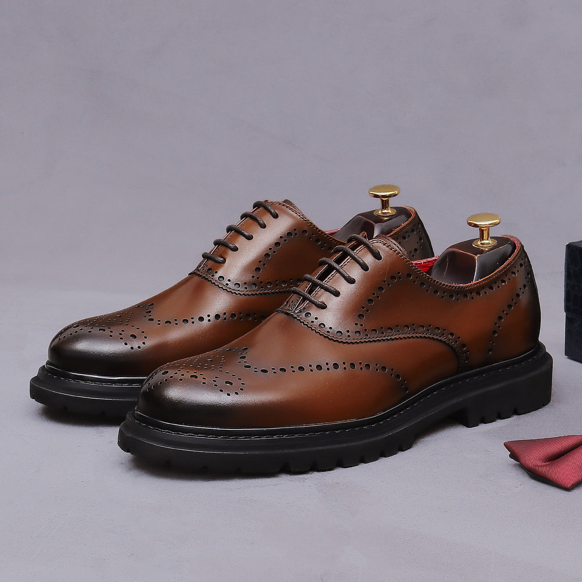 Men's chunky lug sole wingtip brogue oxfords, dark brown, angled pair, lace-up and wingtip brogue