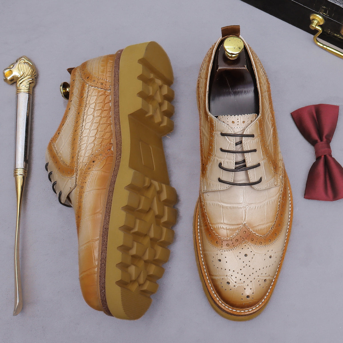 Men's tan leather derby shoes, outsole and side profile visible