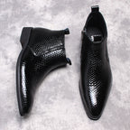 Black textured leather side-zip boots with thick soles, close top opening view.