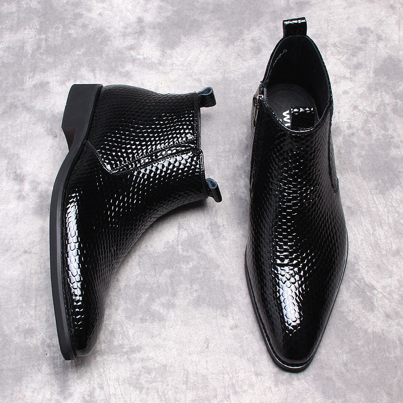 Black textured leather side-zip boots with thick soles, close top opening view.