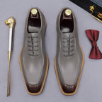 Gray chunky lug-sole brogue Oxford shoes with gray laces, top-down pair view