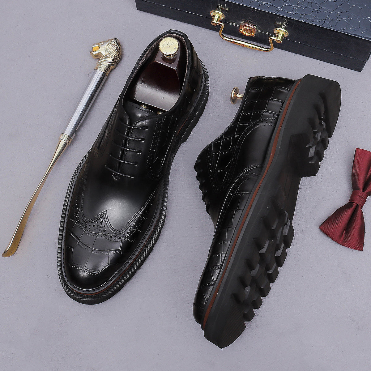 Men's chunky lug sole wingtip brogue oxford shoes, black side profile and tread sole