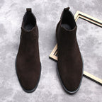 Men's dark brown Chelsea dress boots pair, slip-on with elastic gore