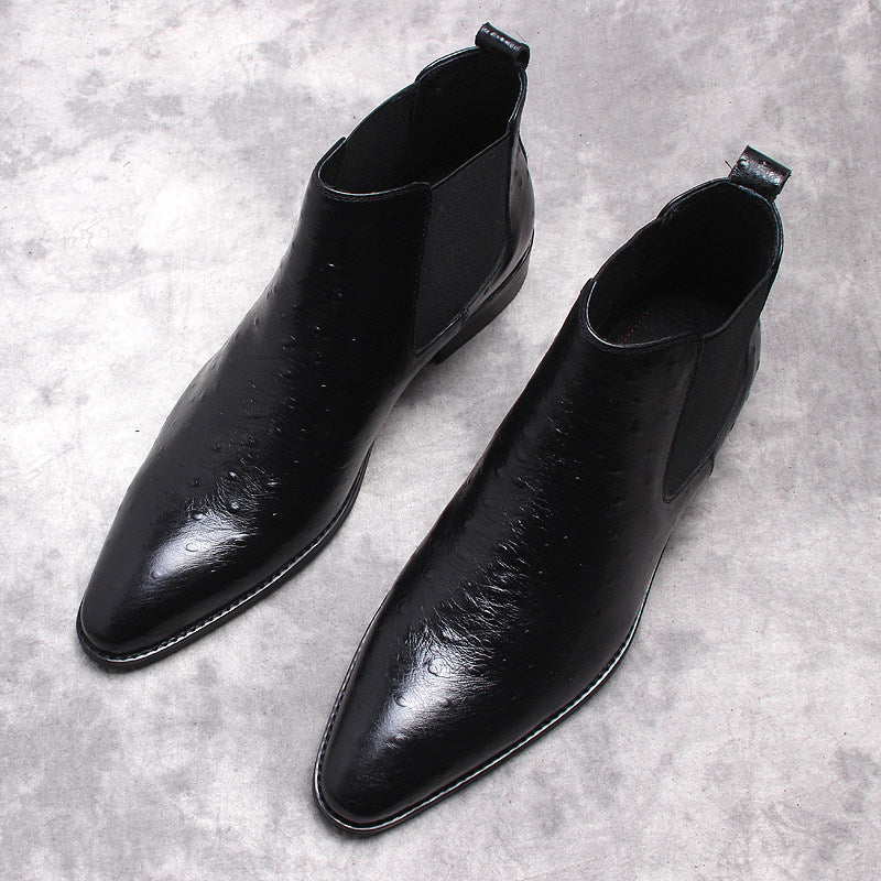 Black leather slip-on Chelsea dress boot pair with side elastic gore