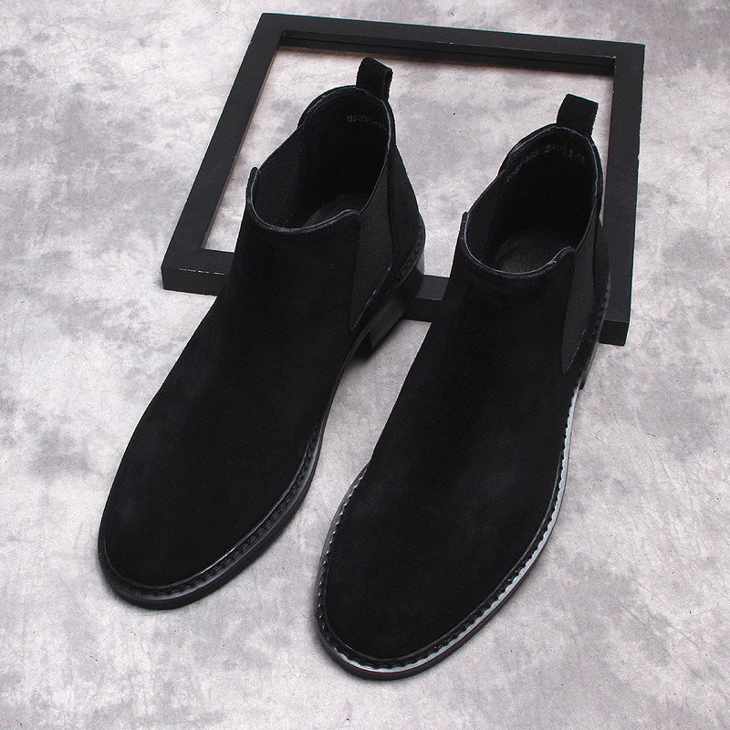 Men's black Chelsea dress boots, front view of slip-on ankle boot with elastic sides