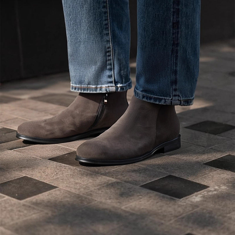 Men's point-toe leather side-zip dress boots in dark brown suede, worn with jeans