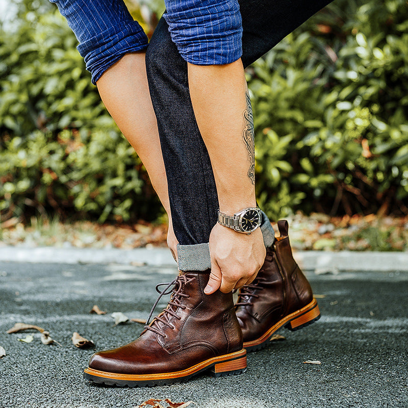 Brown pointed-toe leather ankle dress boots with side-zip and lace-up, shown on foot.