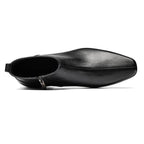 Black leather ankle boot with side zipper detail and open collar lining.