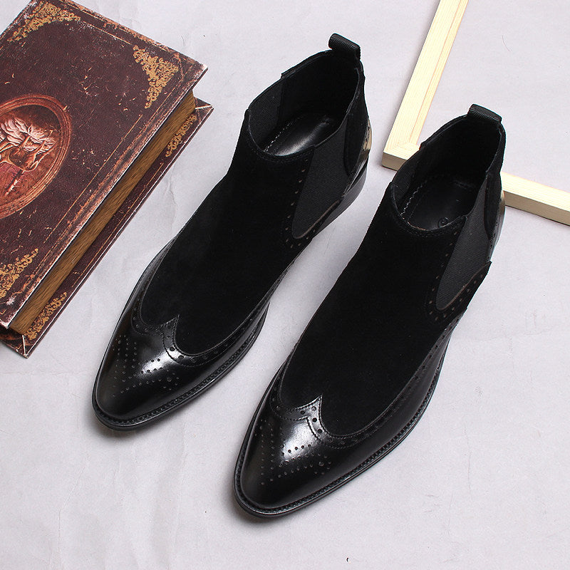 Men's black leather Chelsea dress boots with elastic side panels and brogue toe pattern