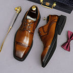 Men's brown leather lace-up derby dress shoes, pointed toe with stacked heel styling.
