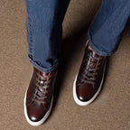 Men's dark brown leather lace-up sneakers with white rubber sole