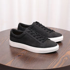 Men's leather sneakers, black, lace-up low-top with white rubber sole