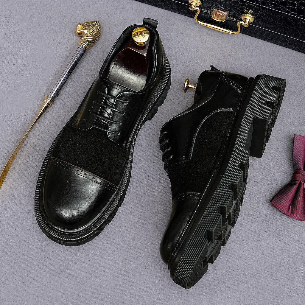 Black lace-up wingtip brogue oxfords with rugged lug outsole and side profile
