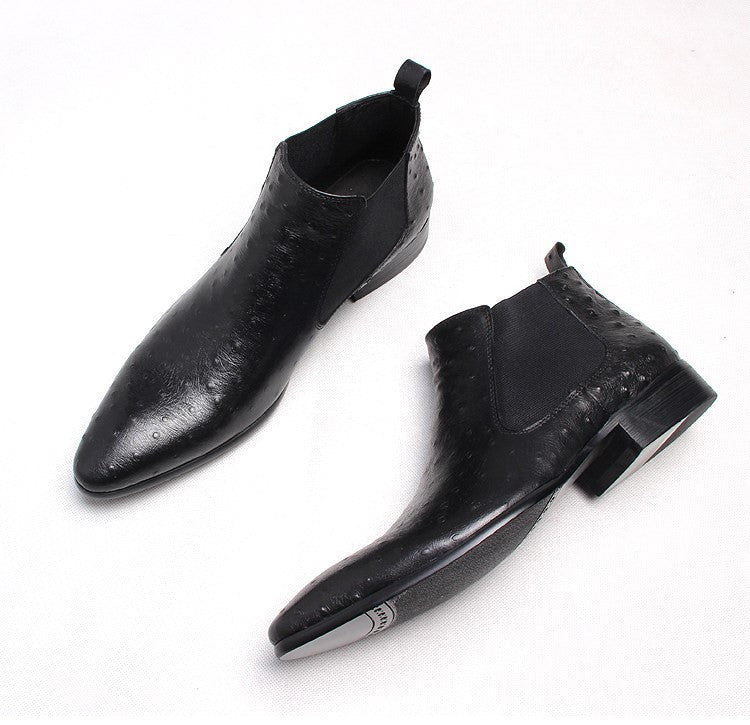 Black leather Chelsea boots, slip-on style with elastic side panels