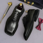 Men's chunky lug-sole wingtip brogue oxfords, black, front and side angles, lace-up.