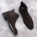 Men's dark brown Chelsea boots with elastic side panels and block heel