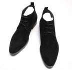 Pair of black lace-up dress boots with V-stitched vamp and low block heel