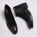 Men's black leather Chelsea boots with elastic gore and perforated toe detailing