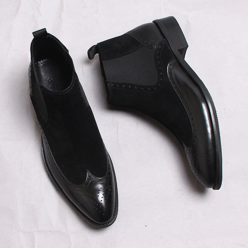 Men's black leather Chelsea boots with elastic gore and perforated toe detailing