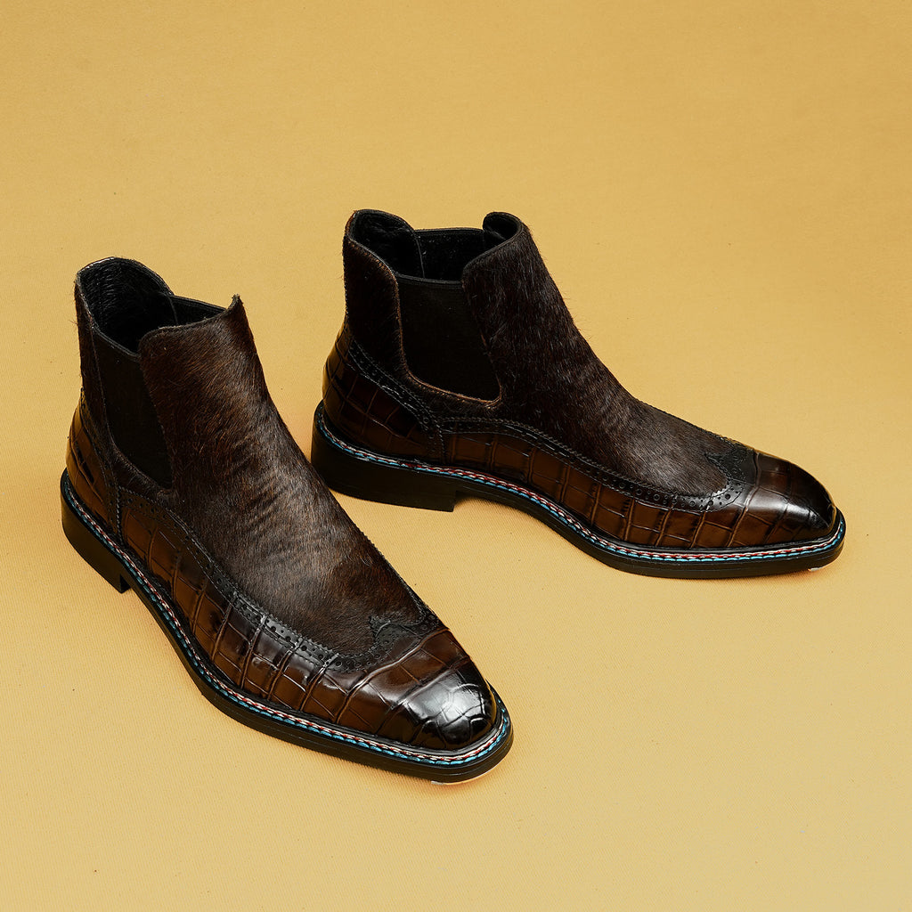 Dark brown leather chelsea dress boots with elastic side panels and glossy toe trim