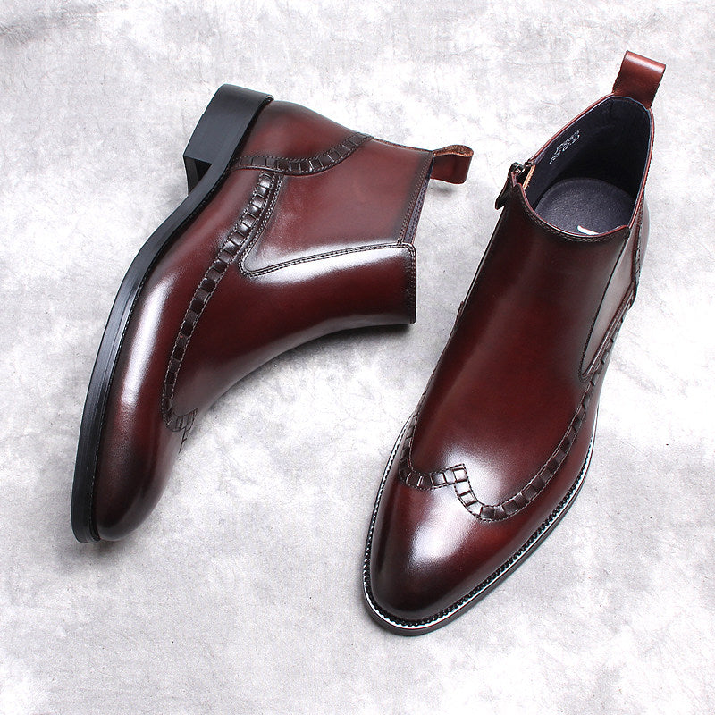 Dark brown leather side-zip ankle boots with thick sole, low heel, and decorative stitching