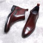 Dark brown leather side-zip ankle boots with thick sole, low heel, and decorative stitching
