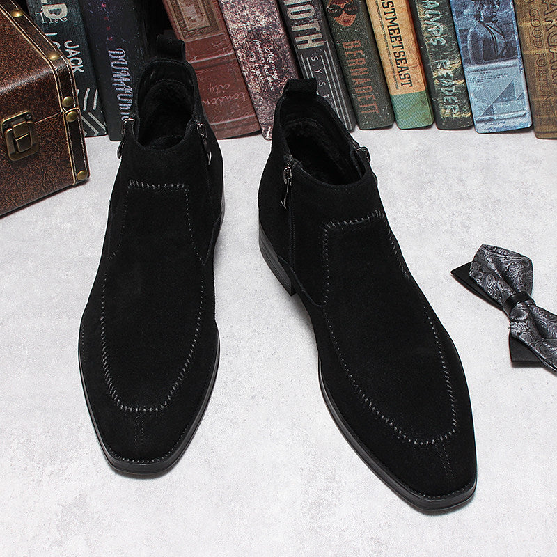 Black suede ankle boots with side zip, thick sole, stitched panels on upper