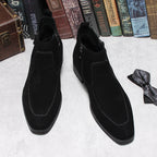 Black suede ankle boots with side zip, thick sole, stitched panels on upper