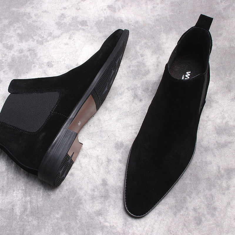 Black Chelsea dress boots: one suede and one smooth leather, side elastic gore