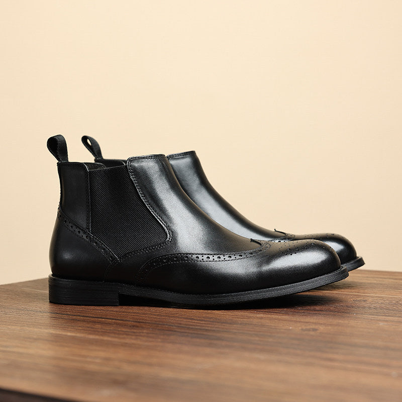 Men's black leather chelsea dress boots, smooth leather upper with elastic side panels.